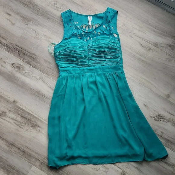 greenish blue dress Sarasota Ruffles, Layers, Front Pockets, Belted Greenish Dress Renata Gasparian